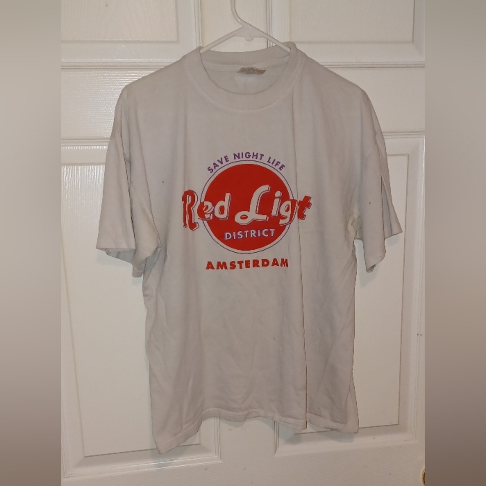 T-shirt bought in Amsterdam 20 yrs ago written little.